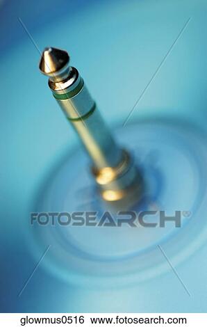 Stock Photograph - Extreme close-up of spindle on record player. Fotosearch