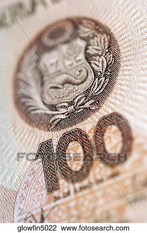 Extreme close-up of symbol and number 100 on bank note View Large Photo Image Stock Image - Extreme close-up of symbol and number 100 on bank note. Fotosearch