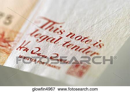 Stock Photo - Extreme close-up of text on bank note. Fotosearch
