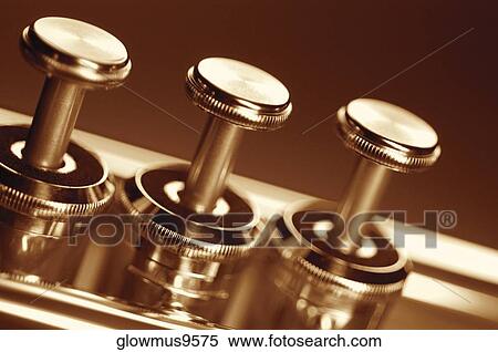 Extreme close-up of trumpet keys View Large Photo Image Stock Photography - Extreme close-up of trumpet keys. Fotosearch
