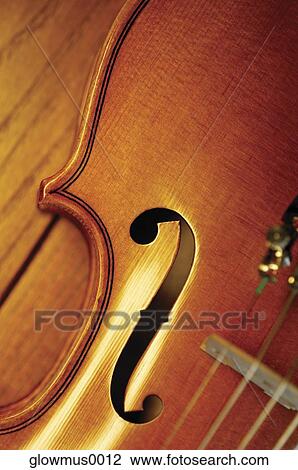 Extreme close-up of violin bridge View Large Photo Image Stock Image - Extreme close-up of violin bridge. Fotosearch