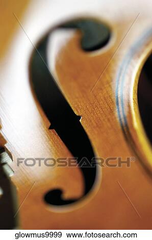 Extreme close-up of violin View Large Photo Image Stock Photo - Extreme close-up of violin. Fotosearch
