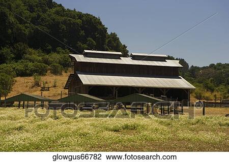 Farmhouse in a field View Large Photo Image Stock Image - Farmhouse in a field. Fotosearch