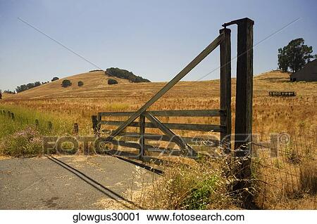 Stock Image - Fence in a field. Fotosearch