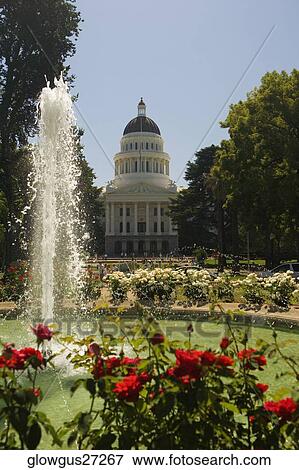 Stock Photo - Fountain in front of a building. Fotosearch