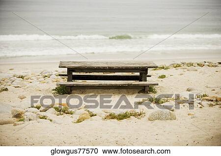 High angle view of a bench on a beach View Large Photo Image Stock Image - High angle view of a bench on a beach. Fotosearch