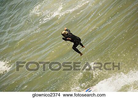 High angle view of a boogie boarder on the beach View Large Photo Image Picture - High angle view of a boogie boarder on the beach. Fotosearch