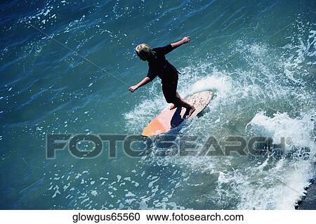 High angle view of a boogie boarder on the beach View Large Photo Image Stock Image - High angle view of a boogie boarder on the beach. Fotosearch