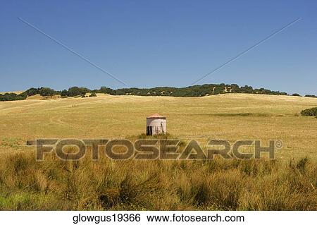 High angle view of a building in a field View Large Photo Image Stock Photograph - High angle view of a building in a field. Fotosearch
