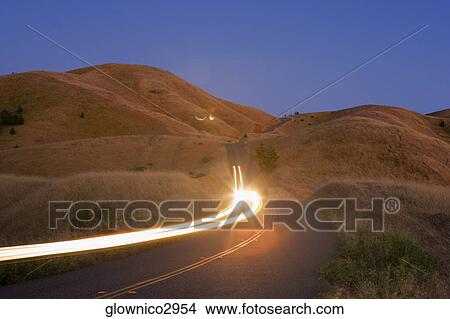 Picture - High angle view of a highway in the wilderness. Fotosearch