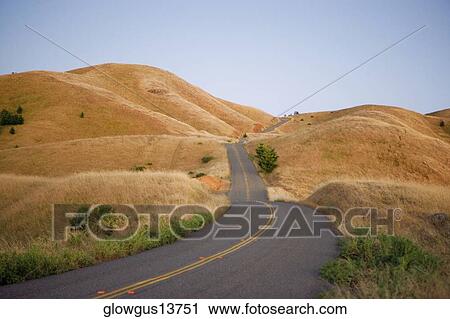 Stock Image - High angle view of a highway in the wilderness. Fotosearch