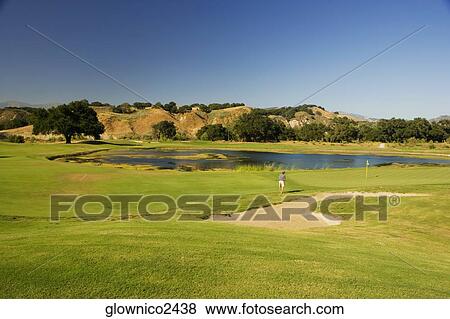 High angle view of a lake on a golf course View Large Photo Image Stock Photo - High angle view of a lake on a golf course. Fotosearch