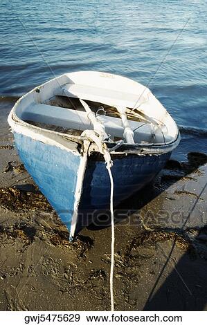 High angle view of a rowboat parked on the shore, San Diego, California, USA View Large Photo Image Stock Photo - High angle view of a rowboat parked on the shore, San Diego, California, USA. Fotosearch