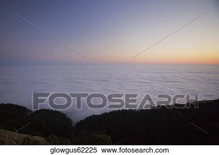 Stock Photography - High angle view of clouds around a hill, Mt. Tamalpais State Park, California, USA. Fotosearch