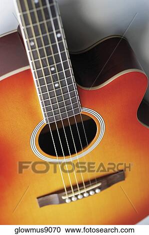 Stock Image - High angle view of guitar. Fotosearch