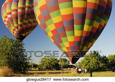 Stock Photo - Hot air balloon preparing to take off. Fotosearch