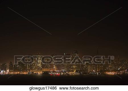 Illuminated buildings at waterfront, California, USA View Large Photo Image Stock Photograph - Illuminated buildings at waterfront, California, USA. Fotosearch