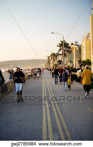 Large group of tourists walking on a pier, San Diego, California, USA View Large Photo Image Picture - Large group of tourists walking on a pier, San Diego, California, USA. Fotosearch