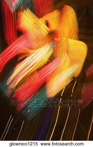 Lights glowing on a carnival ride at night, California, USA View Large Photo Image Stock Photography - Lights glowing on a carnival ride at night, California, USA. Fotosearch