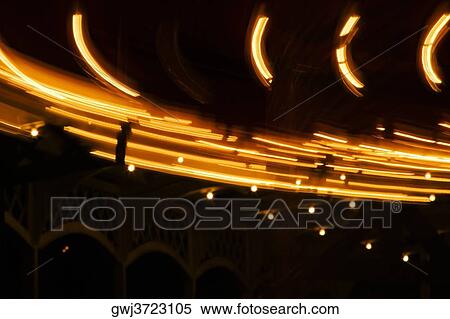 Lights on a carousel in an amusement park at night, San Diego, California, USA View Large Photo Image Stock Photography - Lights on a carousel in an amusement park at night, San Diego, California, USA. Fotosearch