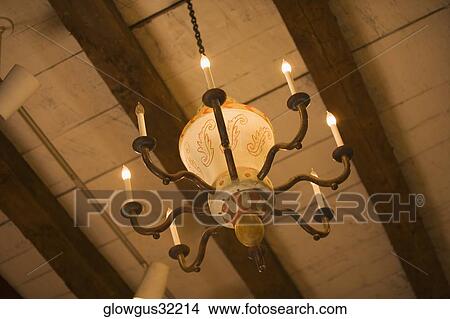 Low angle view of a chandelier View Large Photo Image Picture - Low angle view of a chandelier. Fotosearch