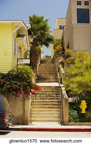 Low angle view of a staircase outside a house View Large Photo Image Stock Image - Low angle view of a staircase outside a house. Fotosearch