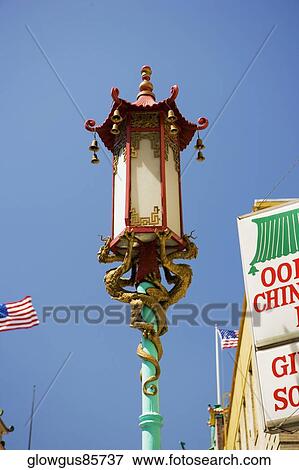 Low angle view of a street light View Large Photo Image Stock Photo - Low angle view of a street light. Fotosearch