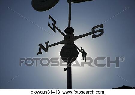 Low angle view of a weather vane View Large Photo Image Stock Image - Low angle view of a weather vane. Fotosearch