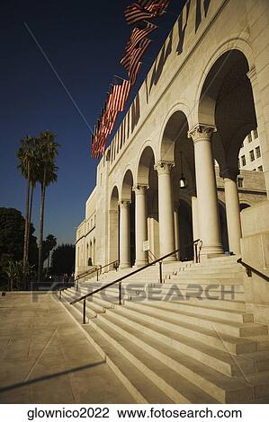 Low angle view of an arrangement of American flags outside a building, City Hall, Los Angeles, California, USA View Large Photo Image Stock Image - Low angle view of an arrangement of American flags outside a building, City Hall, Los Angeles, California, USA. Fotosearch