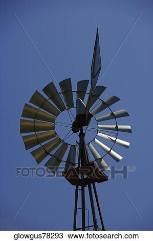 Low angle view of an industrial windmill View Large Photo Image Stock Image - Low angle view of an industrial windmill. Fotosearch