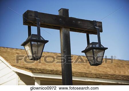Stock Image - Low angle view of an old fashioned street light. Fotosearch