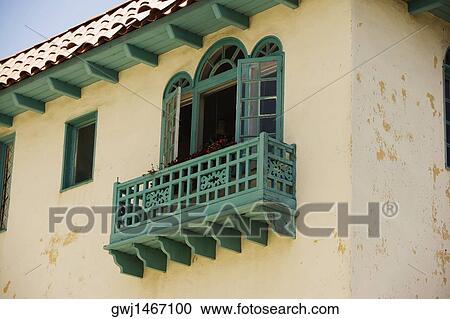 Low angle view of an ornate turquoise balcony View Large Photo Image Stock Image - Low angle view of an ornate turquoise balcony. Fotosearch