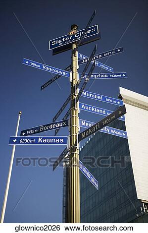 Low angle view of directional signs View Large Photo Image Stock Photograph - Low angle view of directional signs. Fotosearch