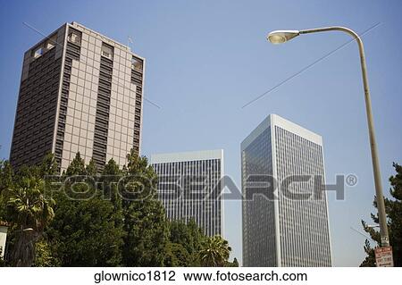 Low angle view of office buildings in a city, Sacramento, California, USA View Large Photo Image Stock Image - Low angle view of office buildings in a city, Sacramento, California, USA. Fotosearch