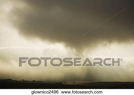 Low angle view of rain clouds View Large Photo Image Stock Photograph - Low angle view of rain clouds. Fotosearch