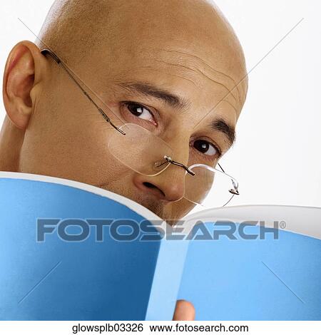 Man wearing glasses and holding report, close-up View Large Photo Image Stock Photograph - Man wearing glasses and holding report, close-up. Fotosearch