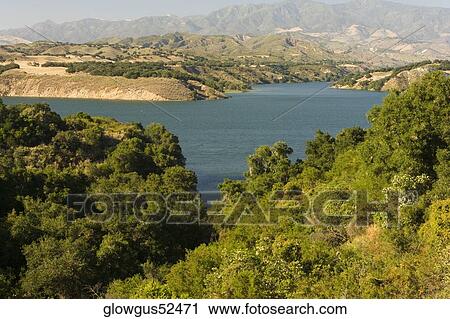 Stock Image - Panoramic view of a lake. Fotosearch