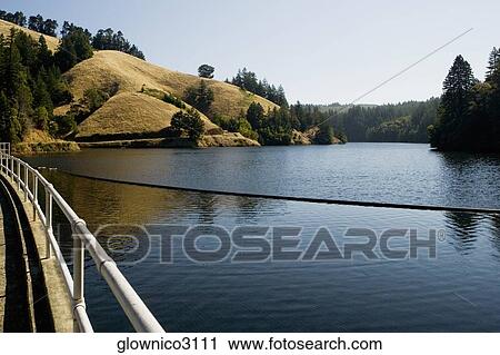 Panoramic view of a lake View Large Photo Image Stock Image - Panoramic view of a lake. Fotosearch