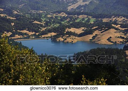 Panoramic view of a lake View Large Photo Image Stock Photograph - Panoramic view of a lake. Fotosearch