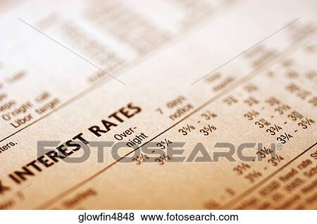 Paper with interest rates, close-up View Large Photo Image Stock Photo - Paper with interest rates, close-up. Fotosearch