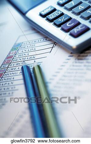 Pencil, calculator and lists of countries with flags next to them graphs, close-up View Large Photo Image Stock Image - Pencil, calculator and lists of countries with flags next to them graphs, close-up. Fotosearch