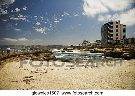 Stock Photo - People walking on a pier, La Jolla, San Diego, California, USA. Fotosearch