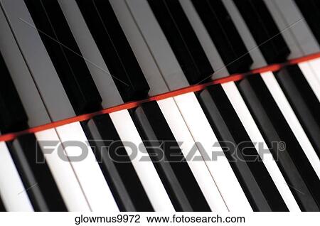 Piano keyboard and its reflection, close-up View Large Photo Image Stock Image - Piano keyboard and its reflection, close-up. Fotosearch