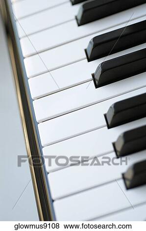 Piano keyboard, close-up View Large Photo Image Stock Photo - Piano keyboard, close-up. Fotosearch