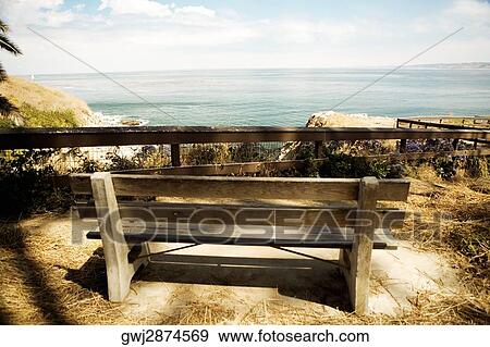 Rear view of a wooden bench on a waterfront, La Jolla, San Diego, California, USA View Large Photo Image Stock Photo - Rear view of a wooden bench on a waterfront, La Jolla, San Diego, California, USA. Fotosearch