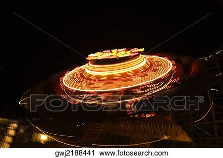 Ride in an amusement park at night, San Diego, California, USA View Large Photo Image Stock Image - Ride in an amusement park at night, San Diego, California, USA. Fotosearch