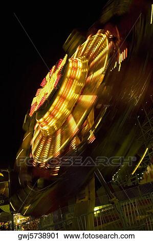 Ride in an amusement park at night, San Diego, California, USA View Large Photo Image Stock Image - Ride in an amusement park at night, San Diego, California, USA. Fotosearch