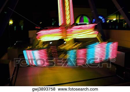 Ride in an amusement park at night, San Diego, California, USA View Large Photo Image Stock Photo - Ride in an amusement park at night, San Diego, California, USA. Fotosearch