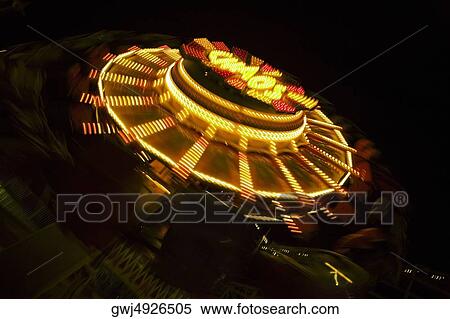 Ride in an amusement park at night, San Diego, California, USA View Large Photo Image Stock Photography - Ride in an amusement park at night, San Diego, California, USA. Fotosearch