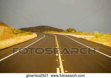 Road passing through a landscape View Large Photo Image Stock Image - Road passing through a landscape. Fotosearch